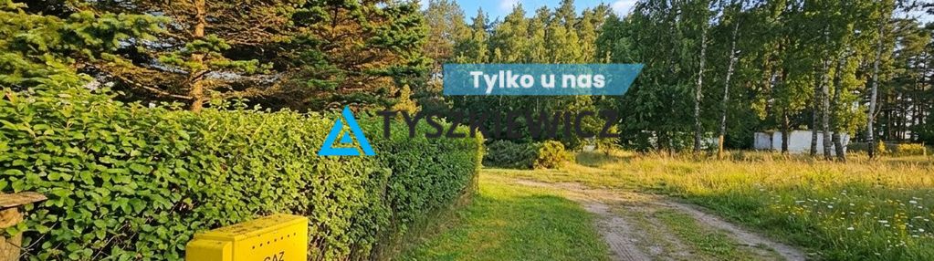 Działka blisko jeziora w spokojnym sąsiedztwie.