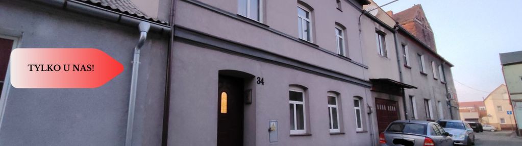 Dom z podwórkiem i garażem w centrum nml