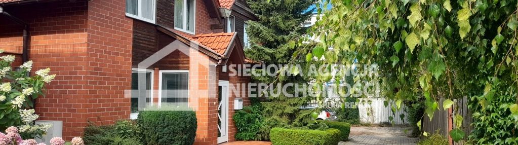 Dom z ogrodem i garażem na małym kacku