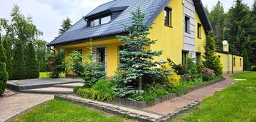 Dom w stanie surowym z pięknym ogrodem