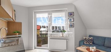 Dupoziomowy apartament z dwoma balkonami