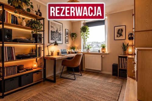 Dwupoziomowe mieszkanie z tarasem i balkonem.