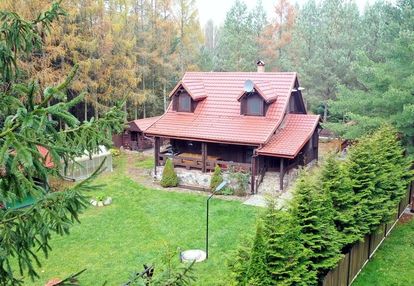 Dom, łódź i pomost nad jeziorem tyrkło góra 50 gm orzysz