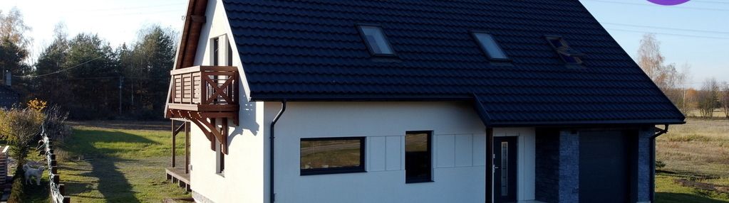 Atrakcyjny dom na dużej i kształtnej działce.