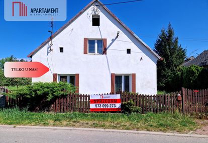 Dom z dwiema działkami i zabudowaniami