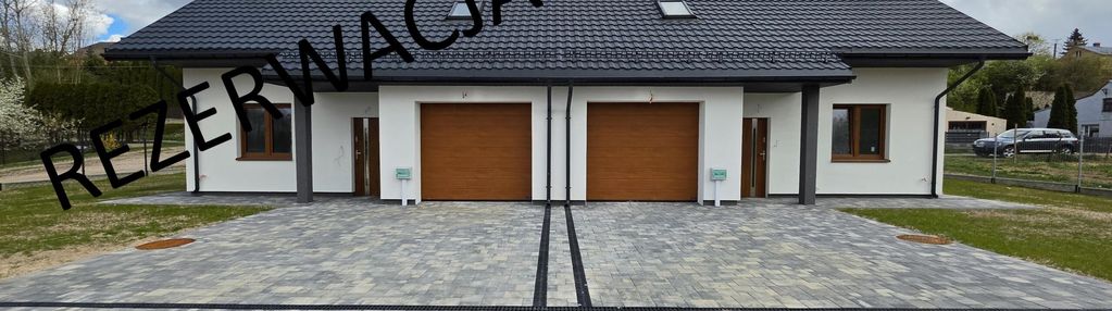 Nowy dom w zabudowie bliźniaczej z garażem i widokiem na łomżę i narew