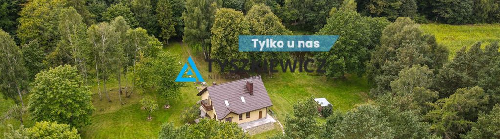 Urokliwy dom w porąbie z własnym stawem