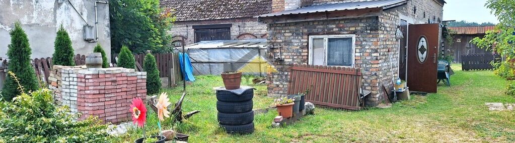 Działki z budynkiem mieszkalnym i gospodarczym