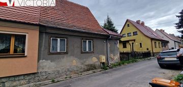 Bliźniak w sąsiedztwie zabudowy jednorodzinnej