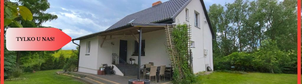 Dom z dużą działką i stawem w spokojnej okolicy