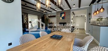 Dom z lasem i stawem w bojanie