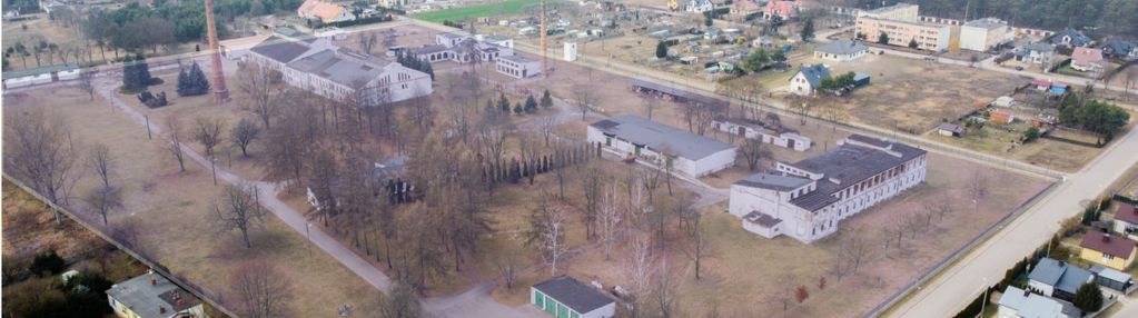 Teren inwestycyjny z halą i pom. magazynowymi