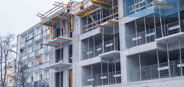 Dwupoziomowe mieszkanie w centrum | dwa balkony