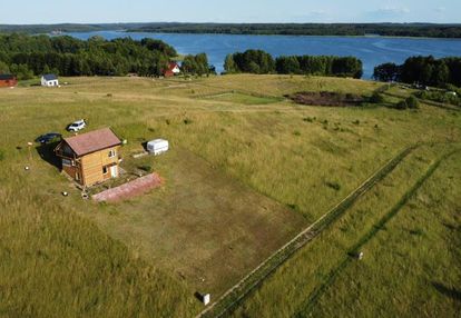 Przepięknie położona działka z domkiem całorocznym