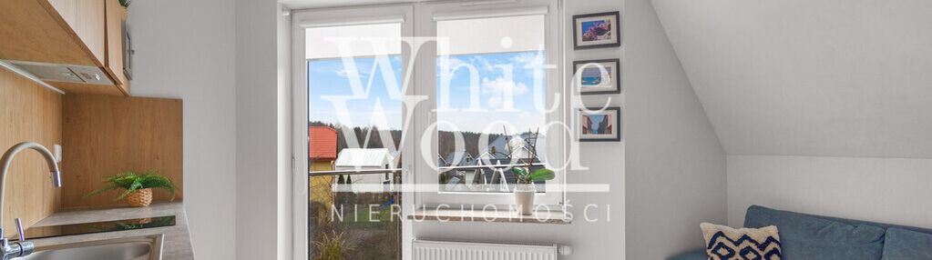 Dupoziomowy apartament z dwoma balkonami