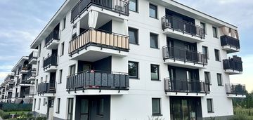 Komfort i funkcjonalność w 2 pokojach z balkonem