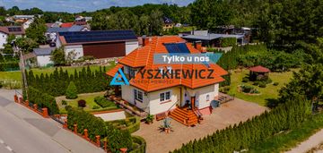Atrakcyjny dom z pięknie zagospodarowanym ogrodem