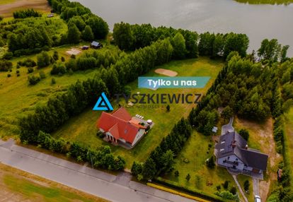 Posiadłość z dużą działką przy linii brzegowej