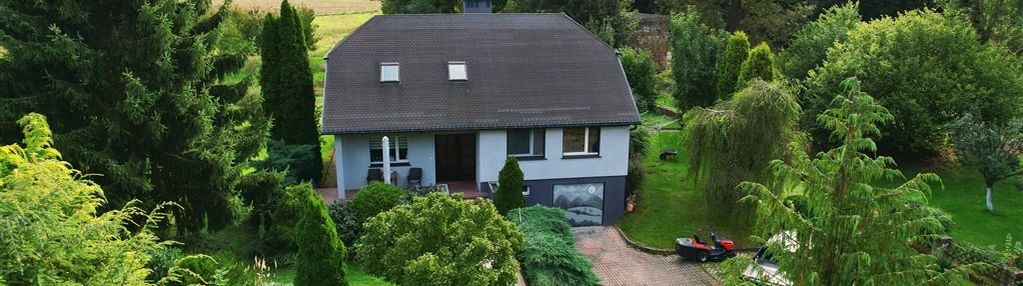 Dom z przepięknym ogrodem i dużą działką