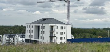 Balkon i jasna kuchnia i przy planowanej pkm