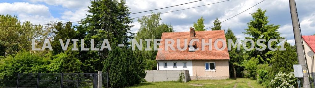 Działka 1564 m² z budynkiem bliźniaczym przy dk12