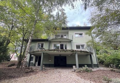 Dom z ogrodem i częścią usługową zasanie