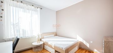 Stylowe 2 pokoje w centrum z pięknym parkietem