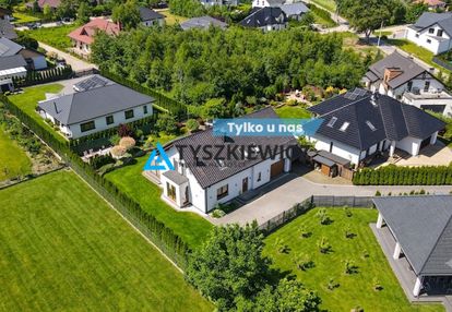 Piękny dom z ogrodem w tuchomiu