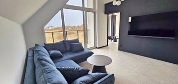 Nowoczesny apartament z antresolą i dużym balkonem