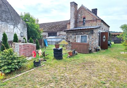 Działki z budynkiem mieszkalnym i gospodarczym