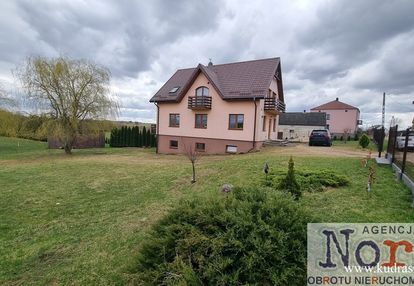 Dom z dużą działką i stawem