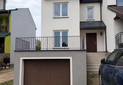 Bliżniak z garażem i ogrodem 199m2