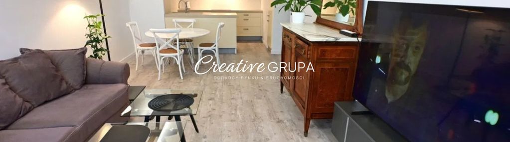 Apartament w sercu miasta z pełną infrastrukturą.