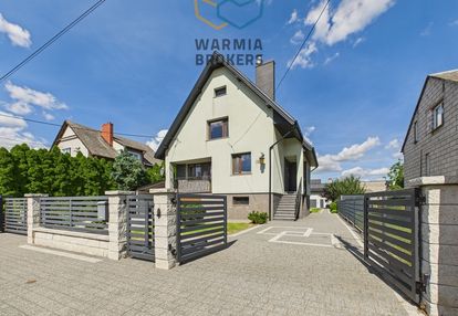 Dom z budynkiem gospodarczym i ogrodem, bieżuń.