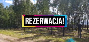 Zalesiona działka budowlana w cichej okolicy.