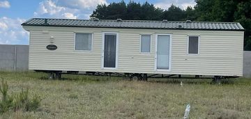 Działka budowlana 1200 m² z domkiem mobilnym.