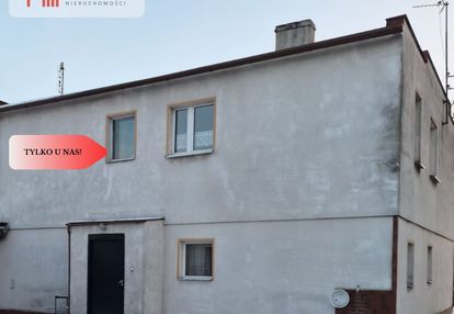 Dom z dwoma mieszkaniami i ogrodem – mrocza