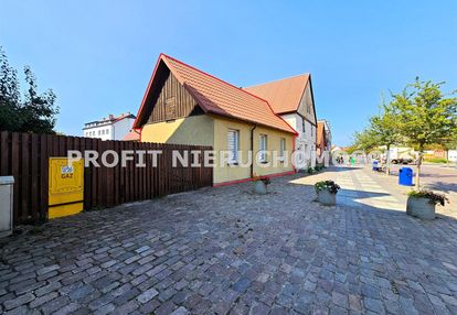 Mieszkanie z garażem z nadobudówką w centrum