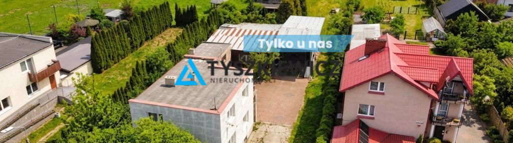 Dom mieszkalny z budynkami pod usługi.