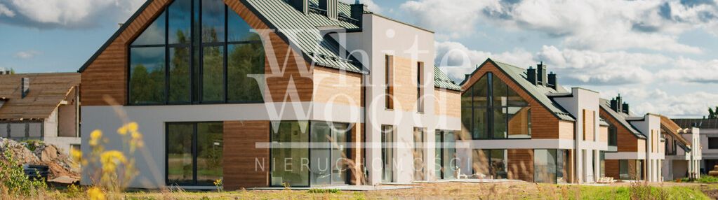 Domy przy jeziorze, tuchom