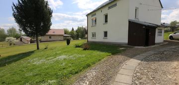 Dom wolnostojący z budynkiem gospodarczym