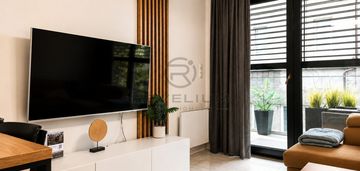 Nowoczesny apartament|miejsce postojowe|inwestycja