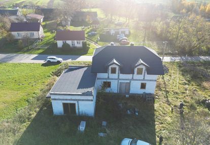 Duża działka 6300m2 z nowym domem do wykończenia.