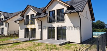 Dom w zabudowie bliźniaczej z garażem