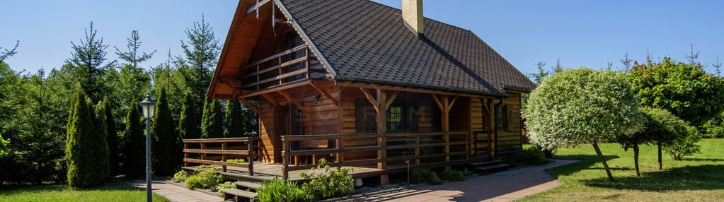 Drewniany dom na dużej działce gliniana góra.