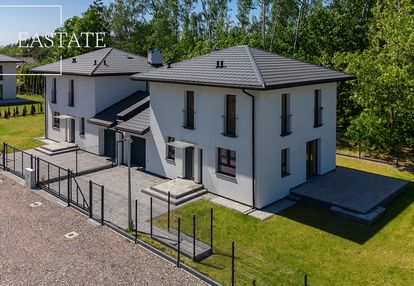 Bliźniaki połączone garażem z działką 500 m2