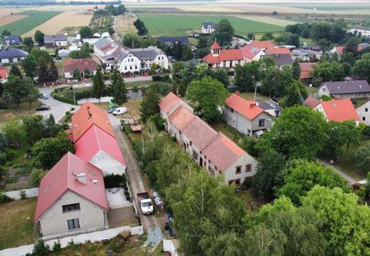 Działka zabudowana budynkiem mieszkalno-gosp.