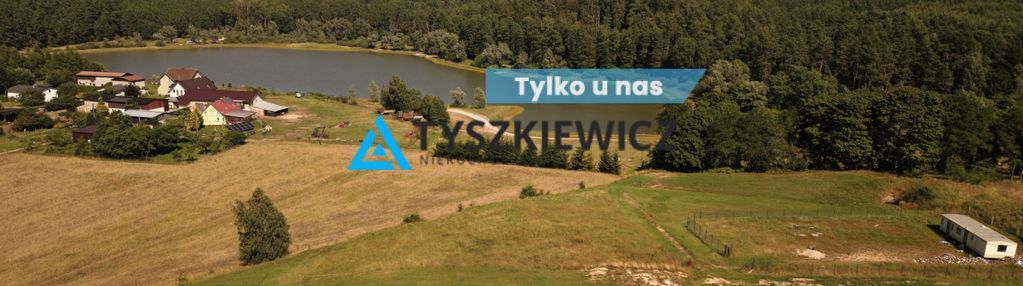 Działka nad jeziorem w okuninie