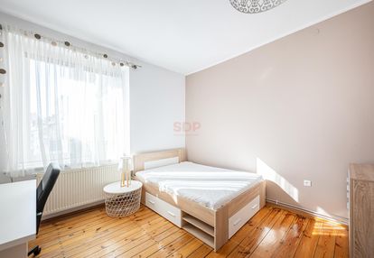 Stylowe 2 pokoje w centrum z pięknym parkietem