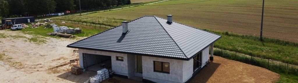 Parterowy dom na widokowej działce, st. dewel.